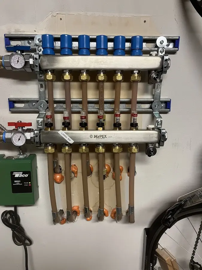 Plumber performing Gas Line Installation at a residential property in Crete